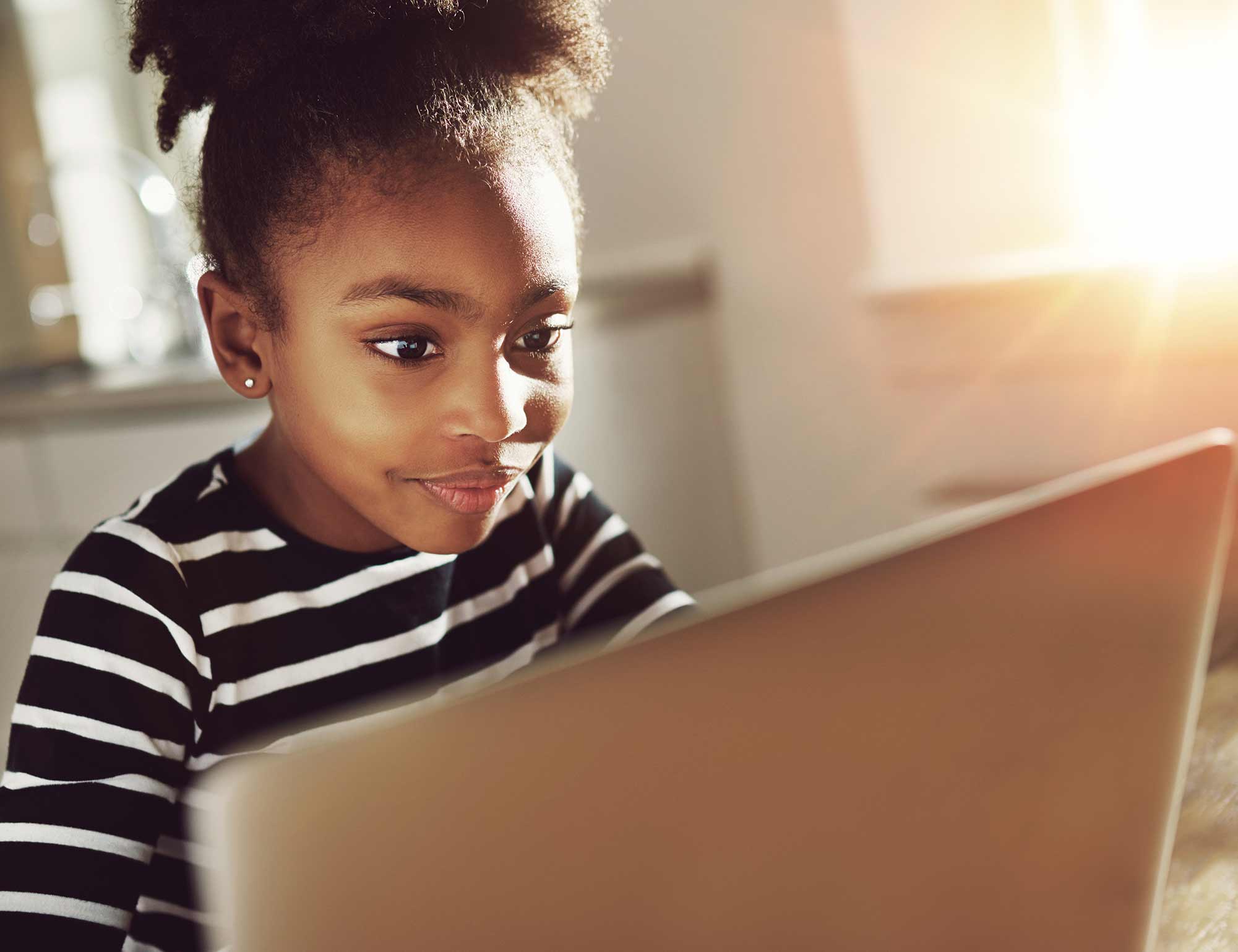 young girl working on a computer