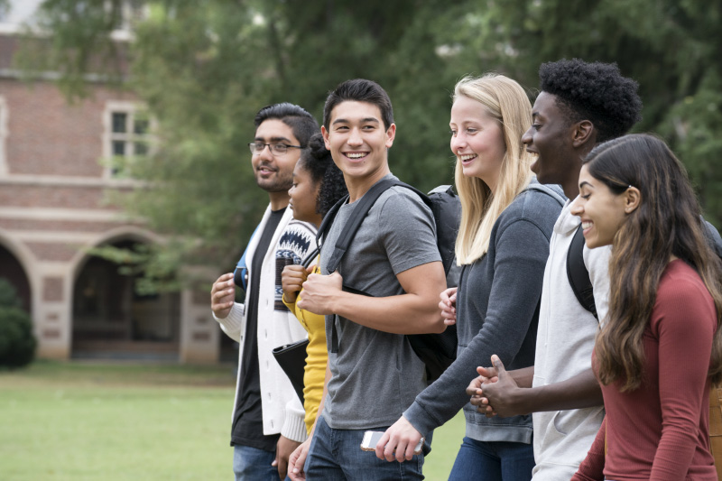 New Friends Walking on University Campus